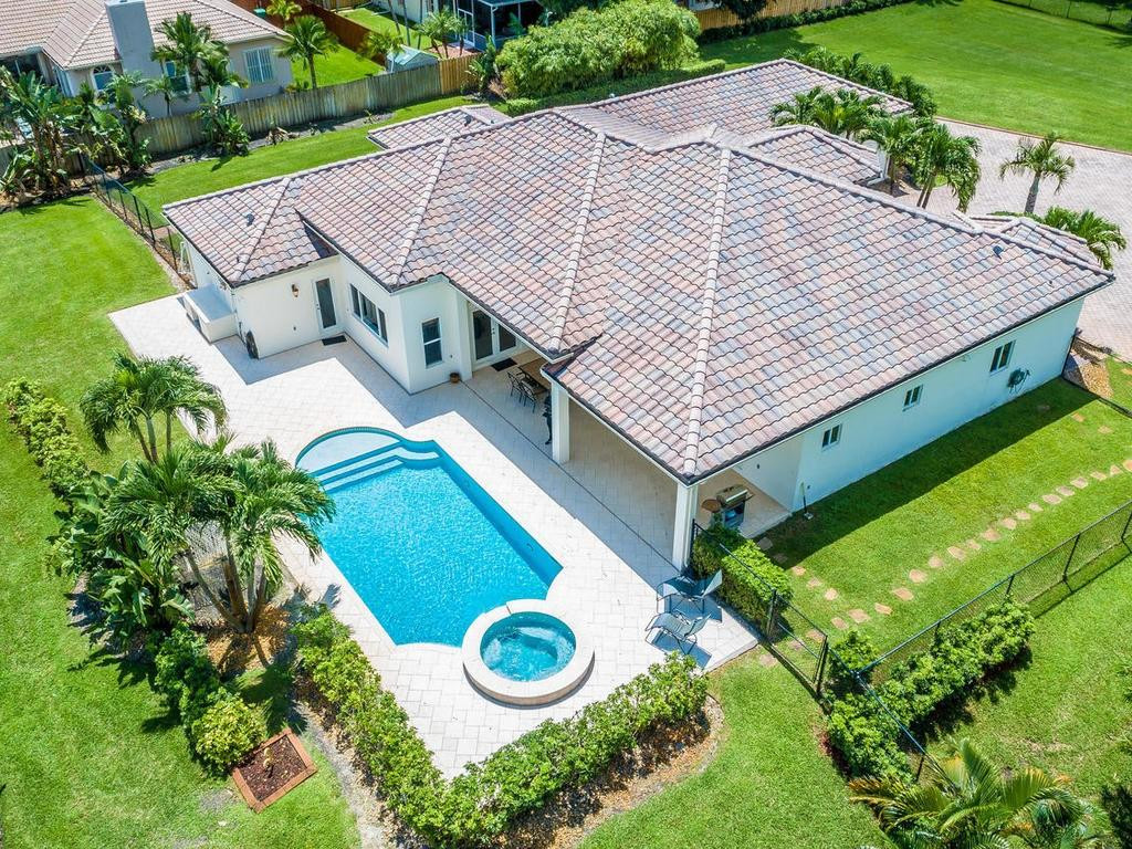 16500 Southwest 62nd Street Southwest Ranches, FL 33331 - Photo 19 of 100 an aerial view of a house with a yard