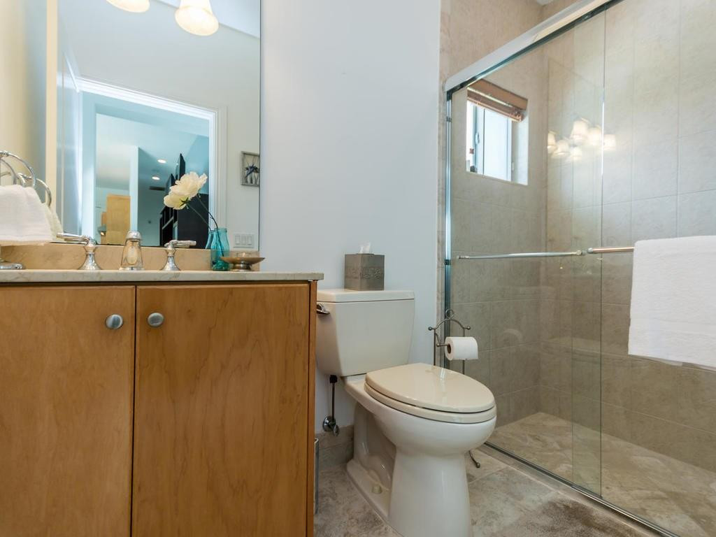 16500 Southwest 62nd Street Southwest Ranches, FL 33331 - Photo 67 of 100 a bathroom with a sink a toilet and shower