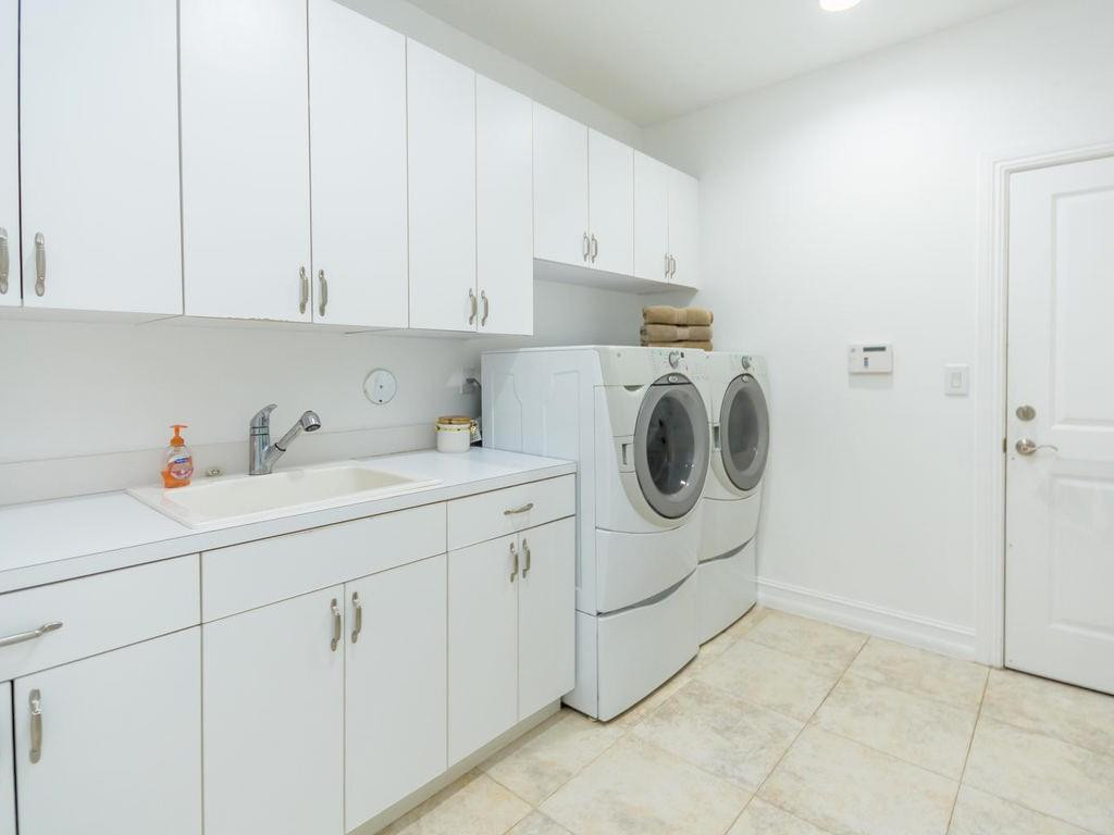 16500 Southwest 62nd Street Southwest Ranches, FL 33331 - Photo 68 of 100 a utility room with dryer and washer