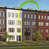 a front view of residential houses with street