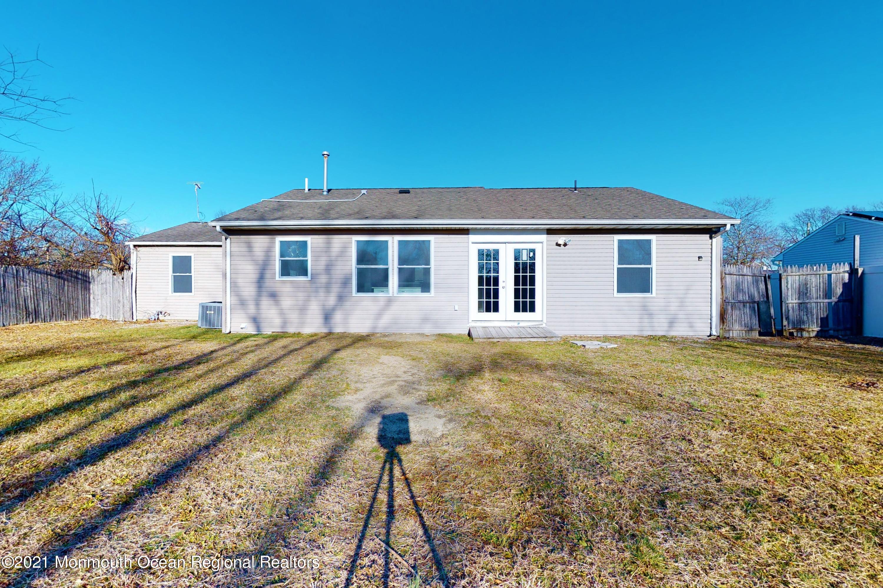 317 Stearman Road Brick, NJ 08723 - Photo 11 of 41 a front view of a house with a yard