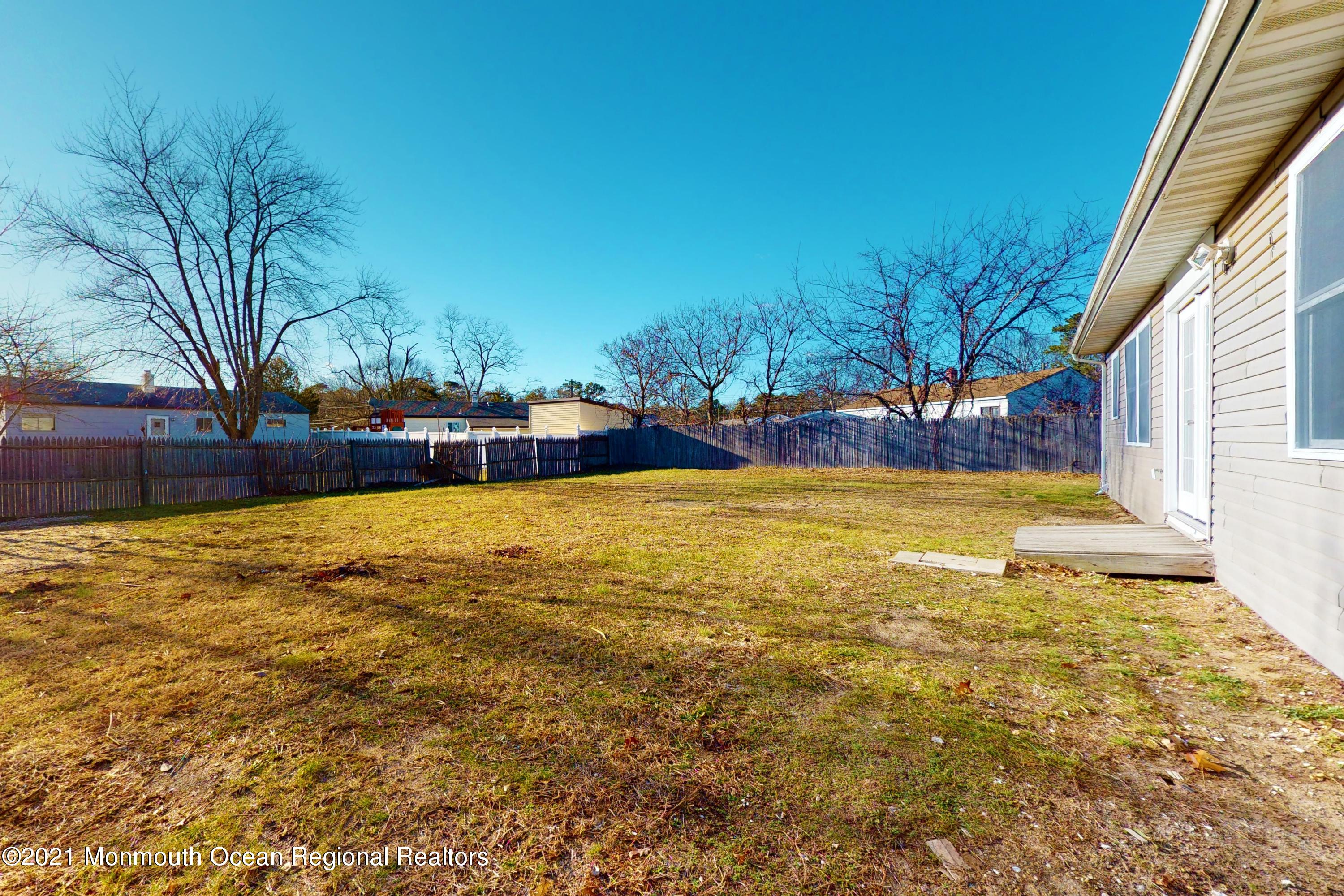 317 Stearman Road Brick, NJ 08723 - Photo 7 of 41 a view of a swimming pool with an outdoor space and seating area
