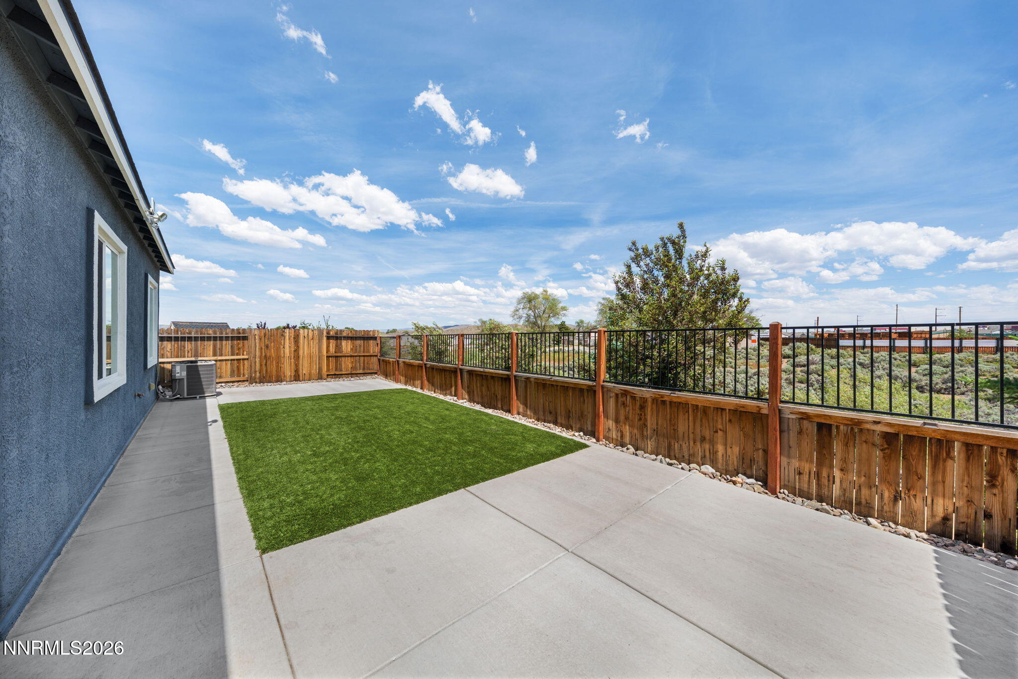 9708 Sea Glass Drive Reno, NV 89506 - Photo 40 of 51 a view of a terrace with yard