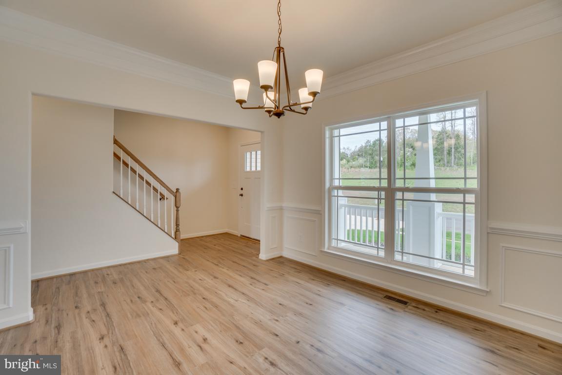 0 Wildwood Road Colonial Beach, VA 22443 - Photo 15 of 38 Foyer w/ staircase + view versatile living room