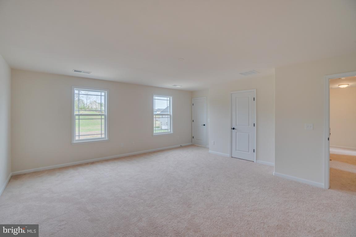 0 Wildwood Road Colonial Beach, VA 22443 - Photo 25 of 38 Large primary suite w/ carpet fl + dual WIC