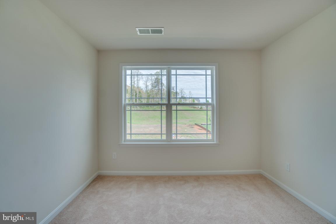 0 Wildwood Road Colonial Beach, VA 22443 - Photo 34 of 38 Fourth bedroom features carpet fl + Large WIC