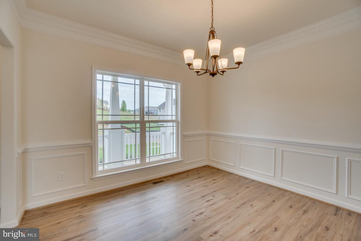 0 Wildwood Road Colonial Beach, VA 22443 - Photo 9 of 38 Spacious flex room w/ crown molding + chair rail