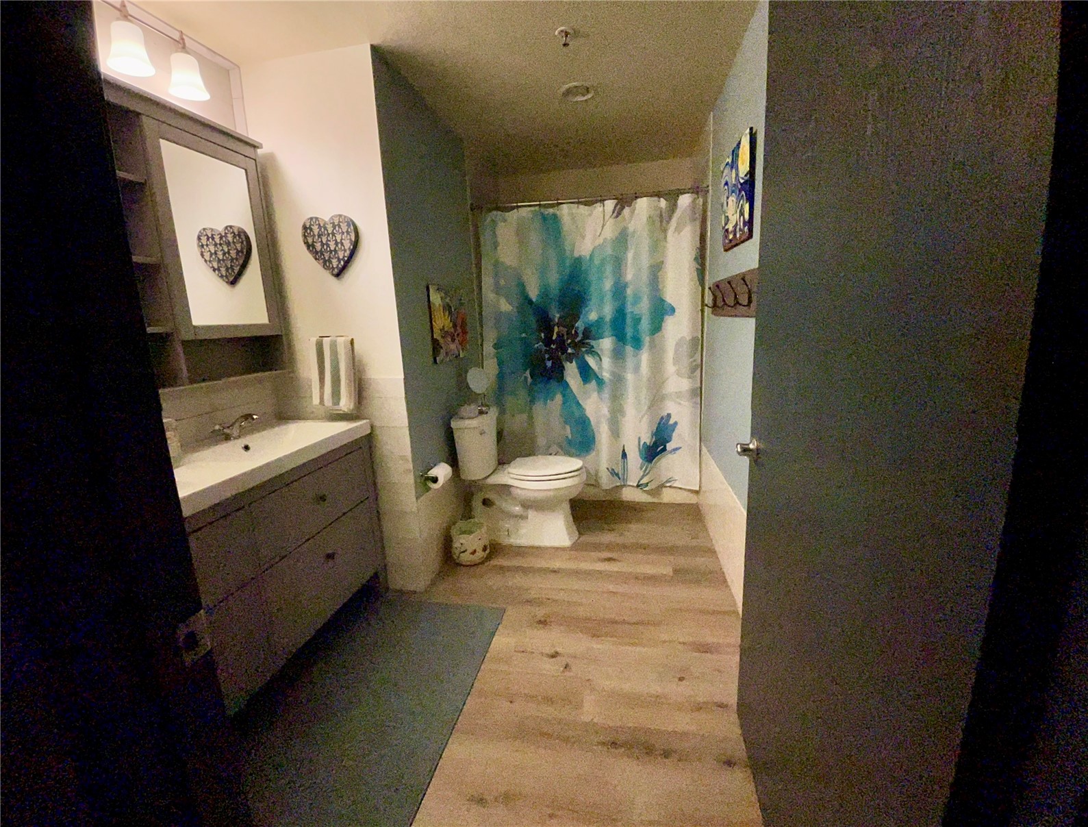 1211 West Keystone Road, Unit 2799 Dillon, CO 80435 - Photo 10 of 29 Bathroom with vanity, light wood-style flooring, and shower / tub combo