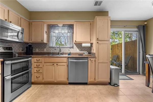 $220,000 | 6157 Northeast Moonstone Court, Lee's Summit, MO 64064