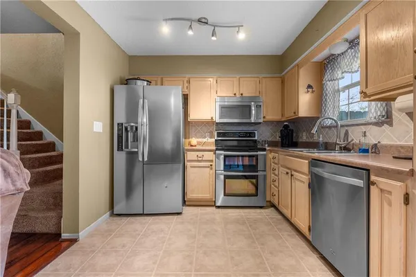 $220,000 | 6157 Northeast Moonstone Court, Lee's Summit, MO 64064