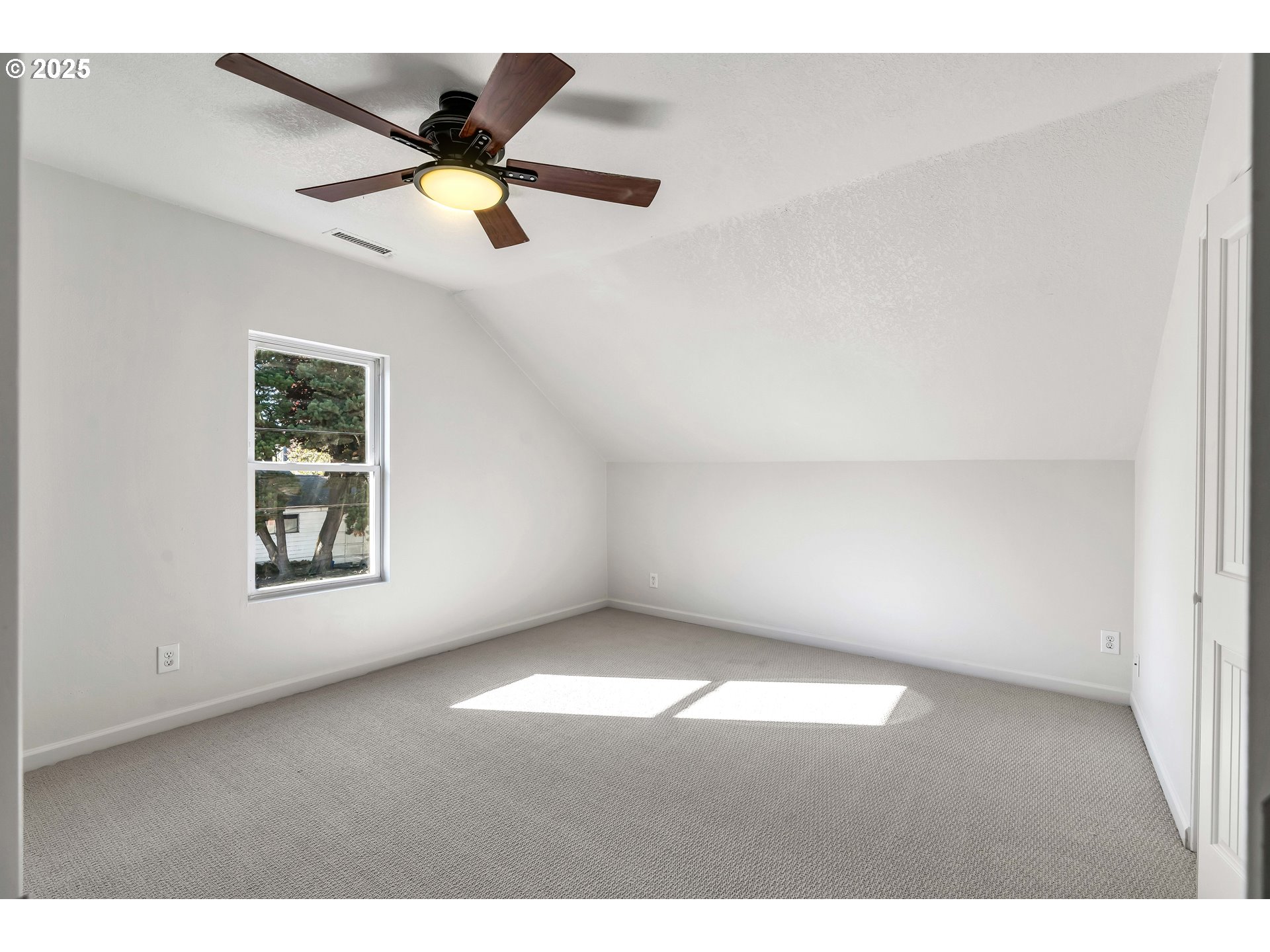 1307 North Kilpatrick Street Portland, OR 97217 - Photo 24 of 46 a view of an empty room with a window