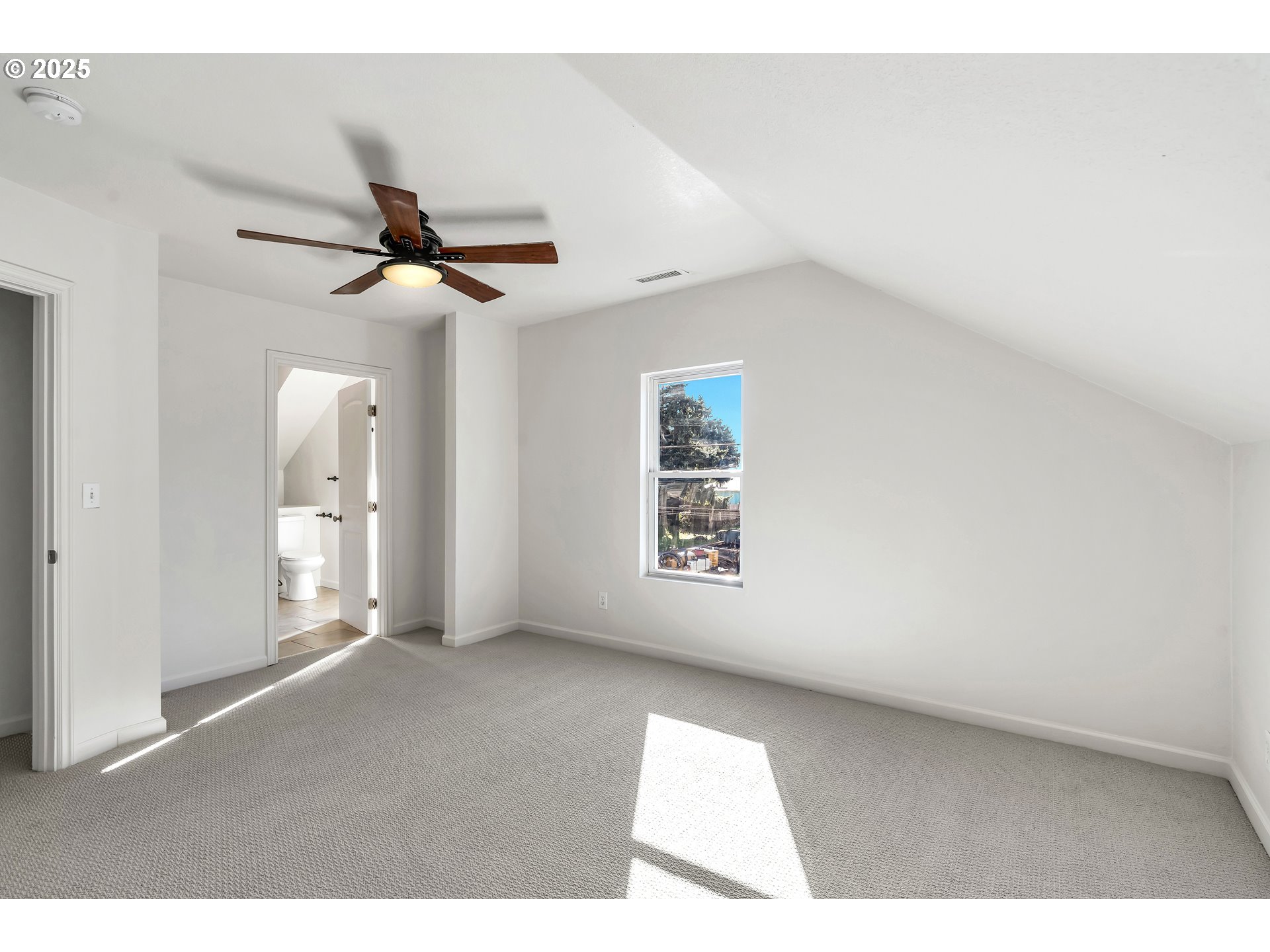 1307 North Kilpatrick Street Portland, OR 97217 - Photo 25 of 46 a view of an empty room with a window
