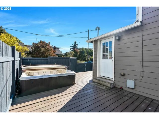 a view of kitchen with furniture and wooden floor