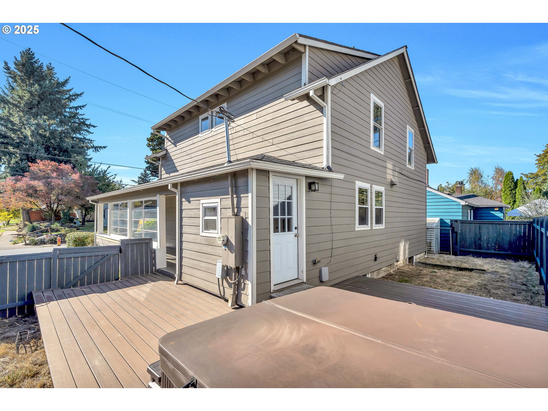 1307 North Kilpatrick Street Portland, OR 97217 - Photo 34 of 46 a view of a house with a yard and wooden fence