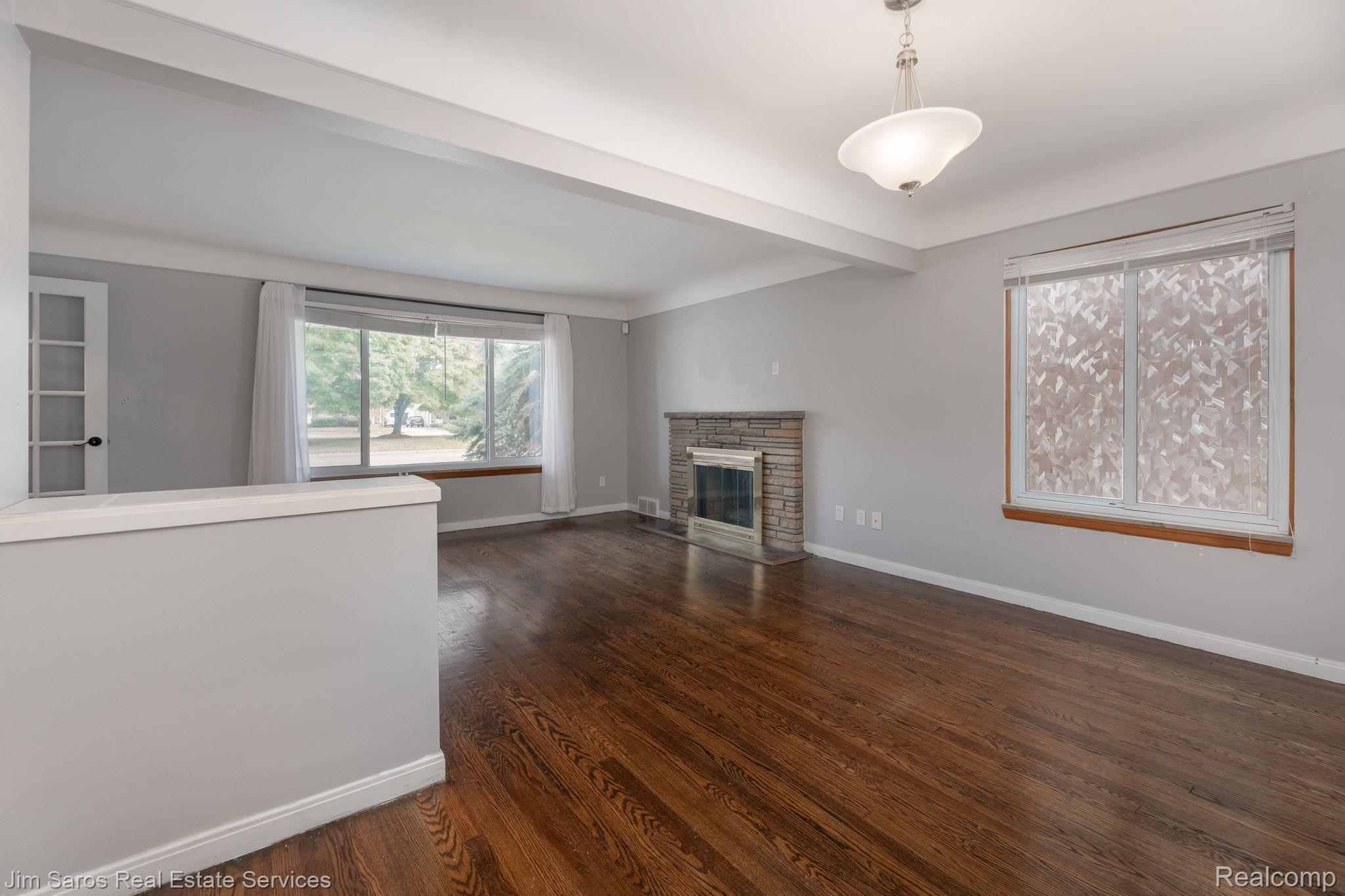 2053 Vernier Road Grosse Pointe, MI 48236 - Photo 4 of 14 Lower Unit Living + Dining Room