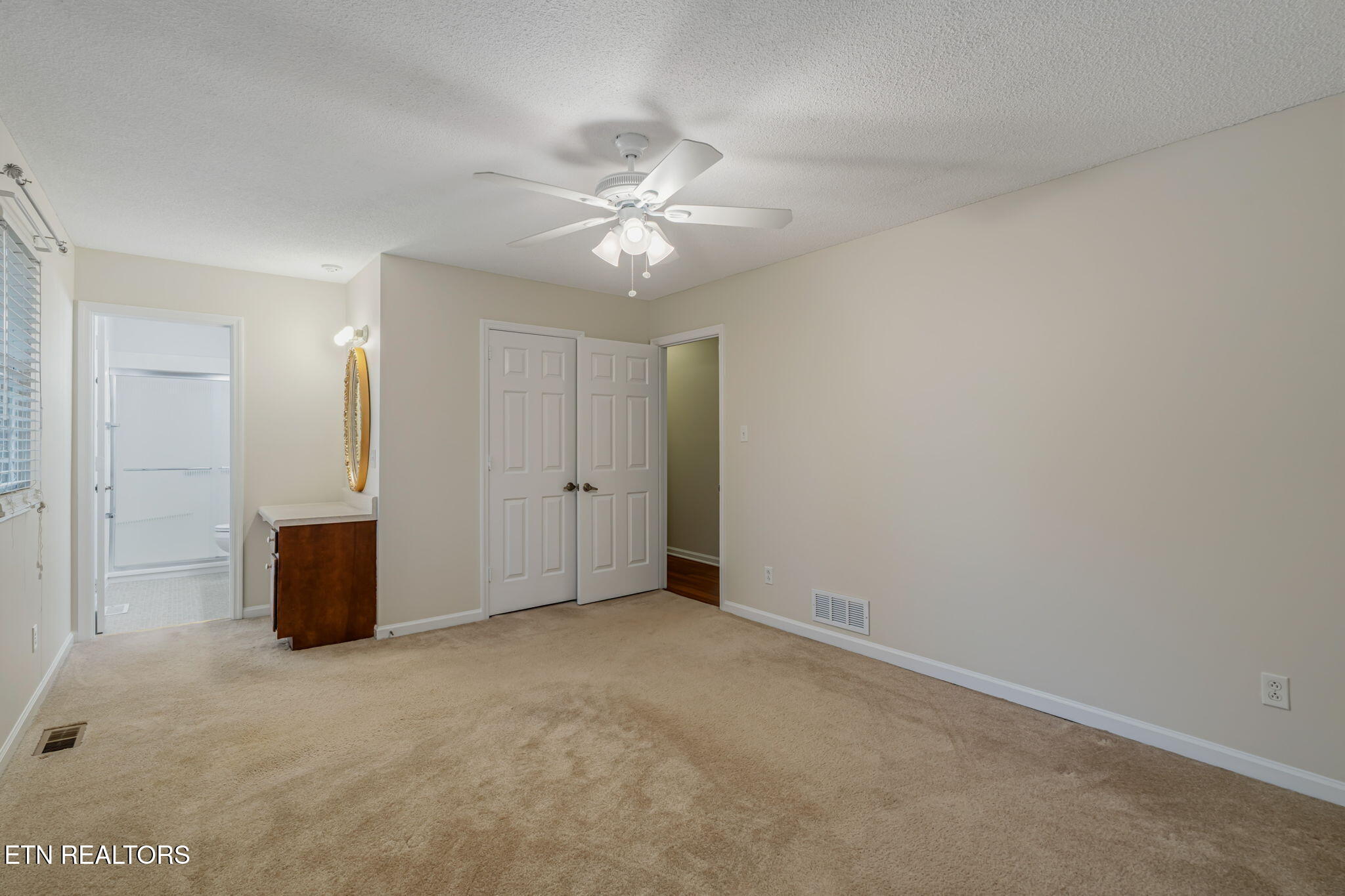 7921 Blueberry Road Powell, TN 37849 - Photo 15 of 34 Primary Bedroom towards Bathroom