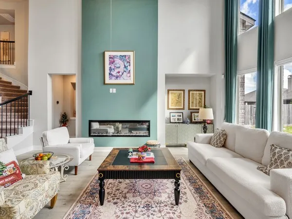 a kitchen with counter top space and living room