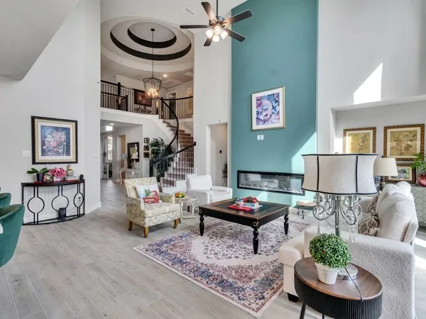 a dining room with furniture and wooden floor