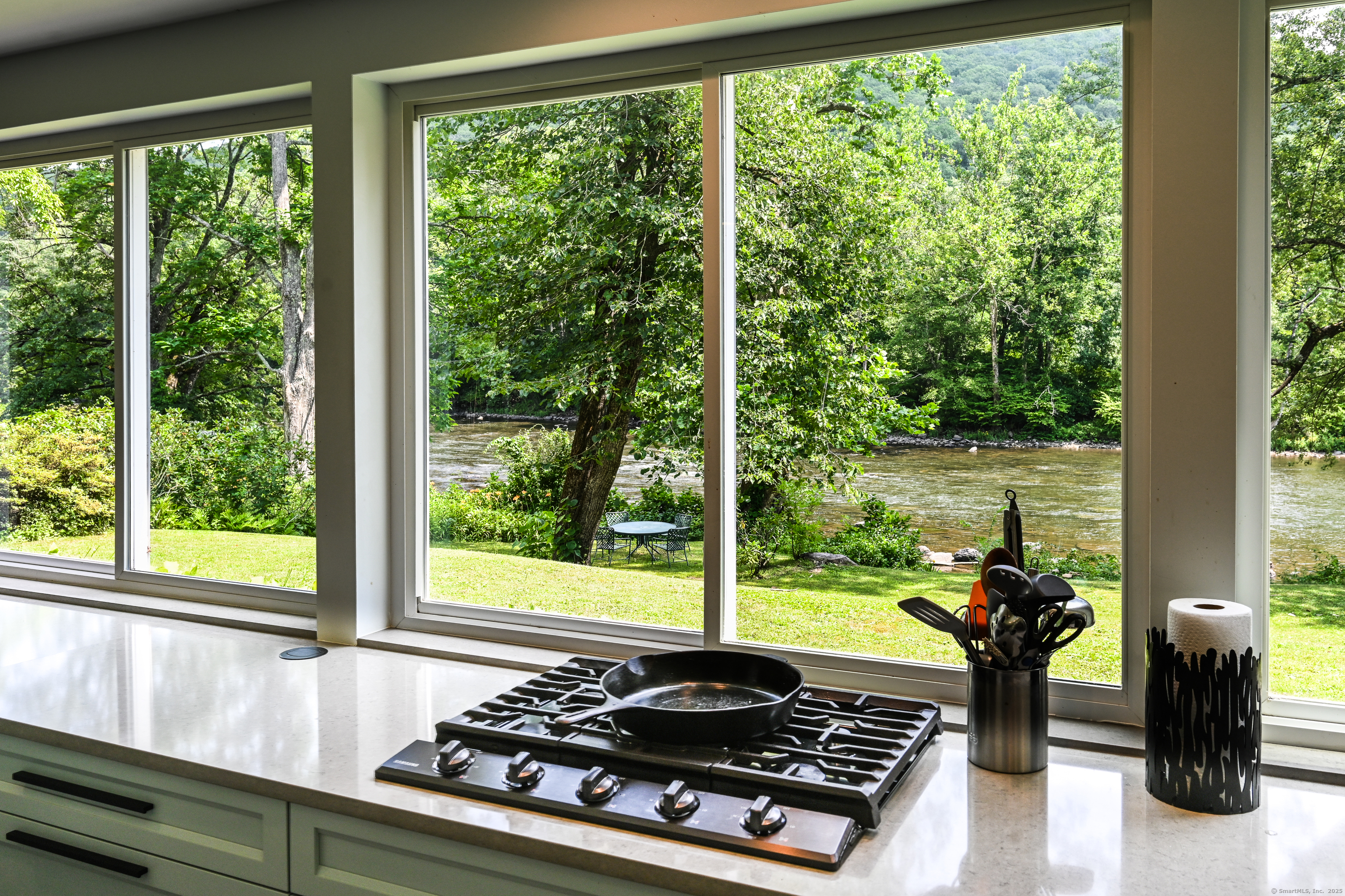 35 Kirk Road Sharon, CT 06796 - Photo 30 of 40 a view of a floor to ceiling window with a yard