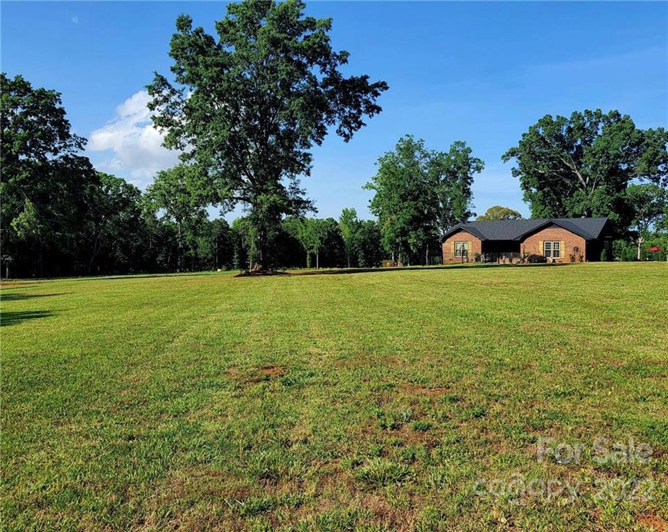 2211 Camden Road Wingate, NC 28174 - Photo 12 of 21 a view of a lake view