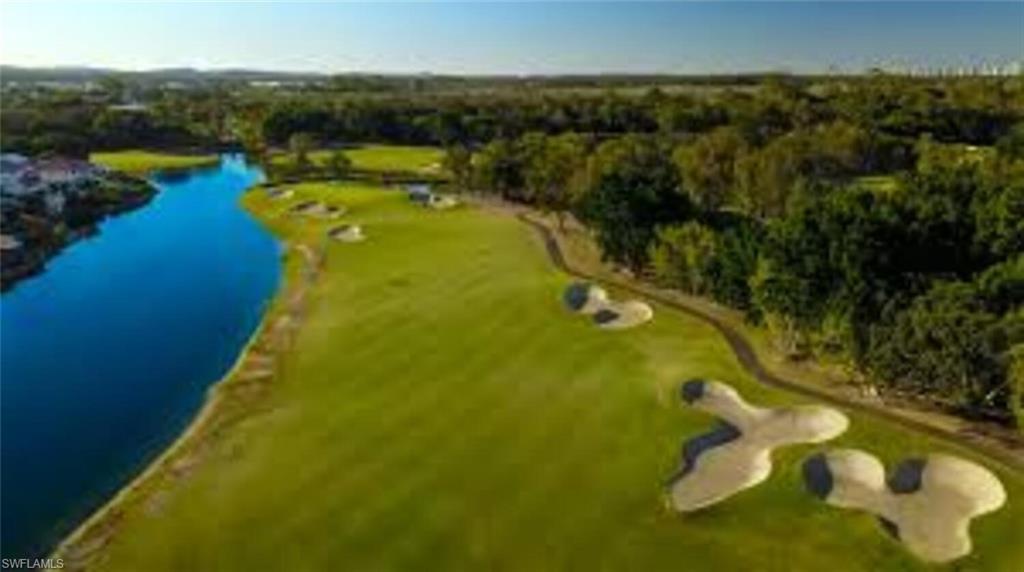 500 Teryl Road, Unit 2312 Naples, FL 34112 - Photo 42 of 46 Bird's eye view of a large body of water and a local golf course