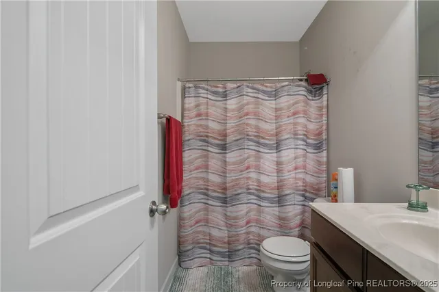 a view of a patio with a table chairs and backyard