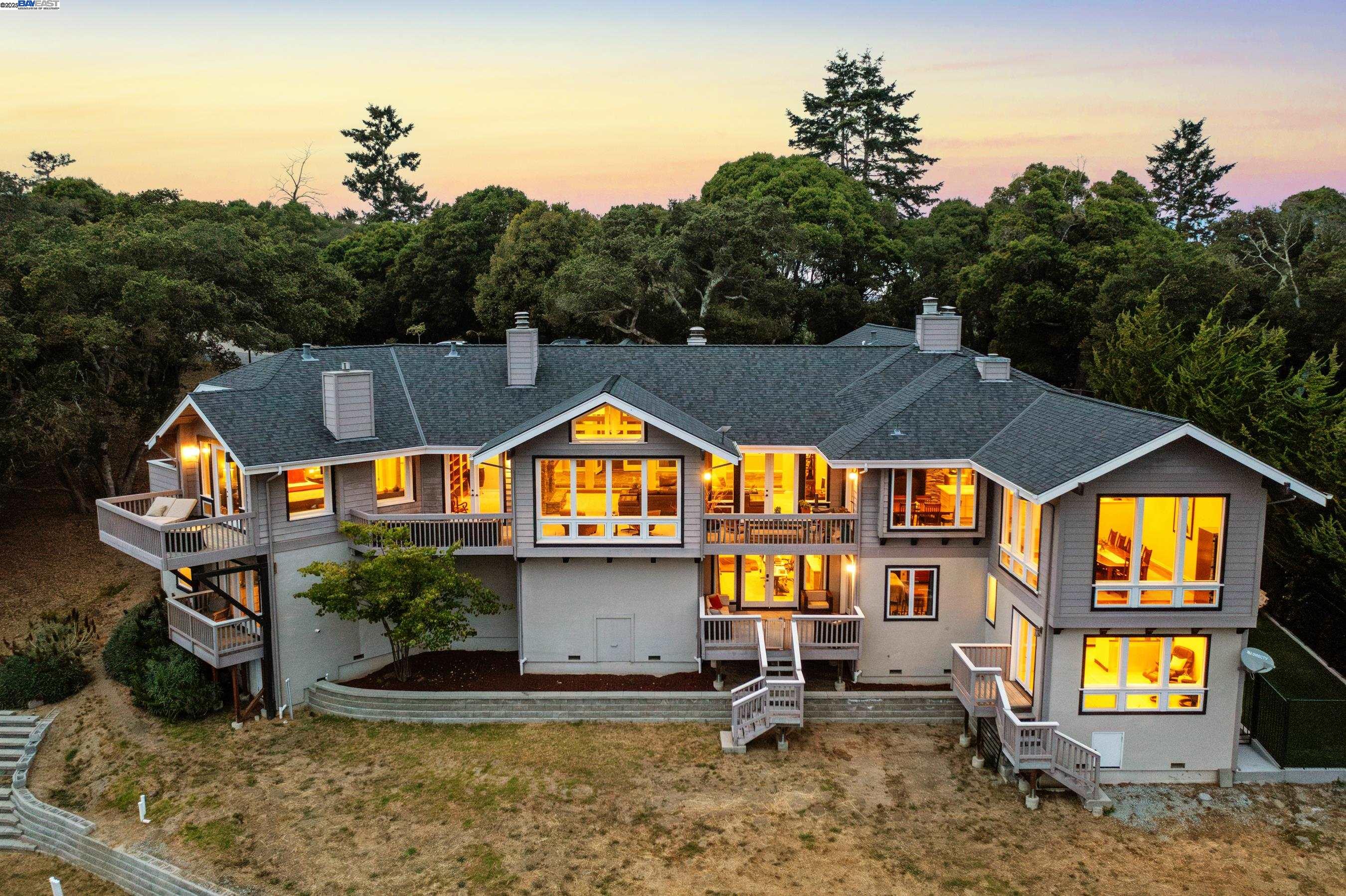 an outdoor space with furniture and mirror