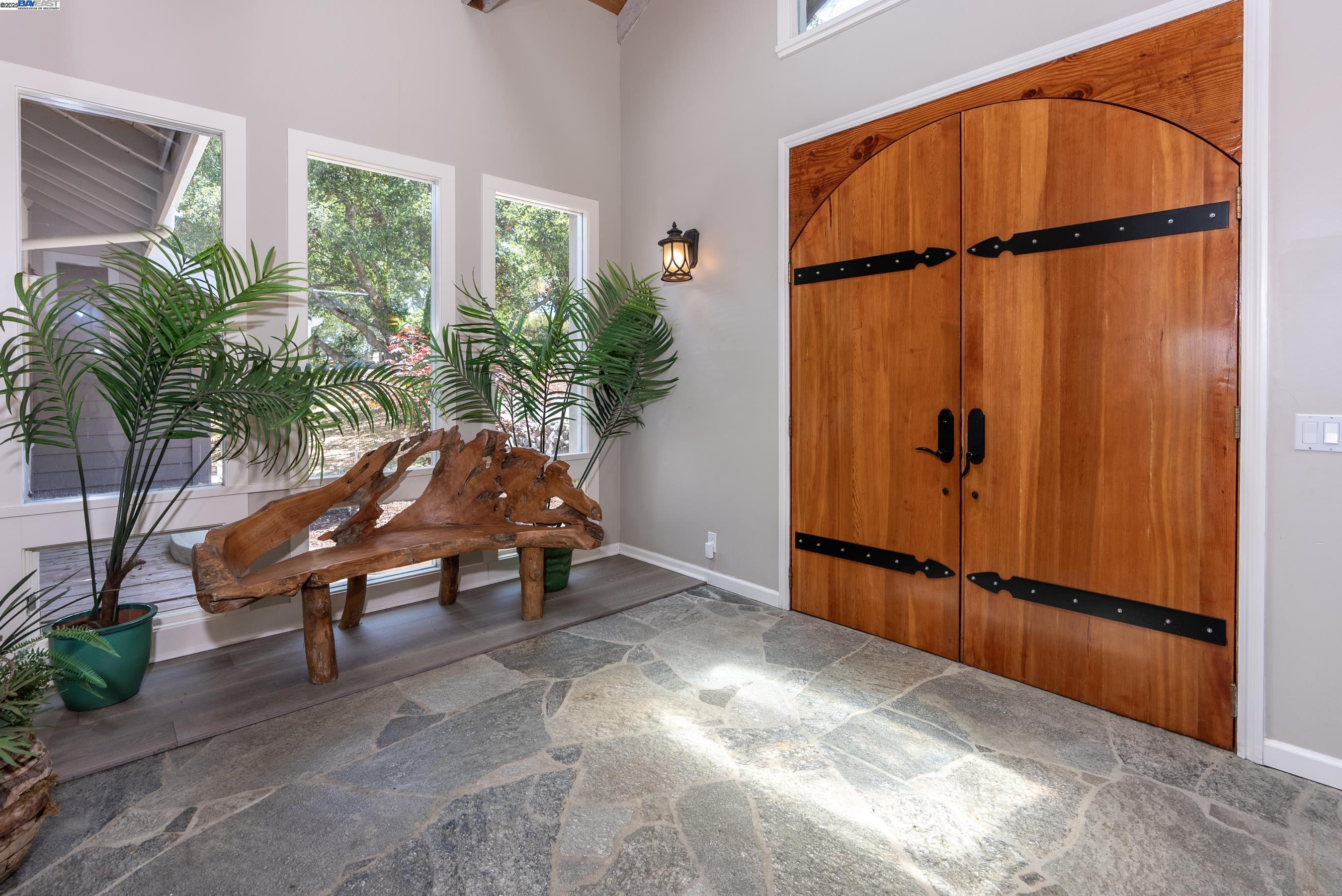 905 Moon Valley Ranch Road Watsonville, CA 95076 - Photo 12 of 60 a view of a room with furniture and a potted plant