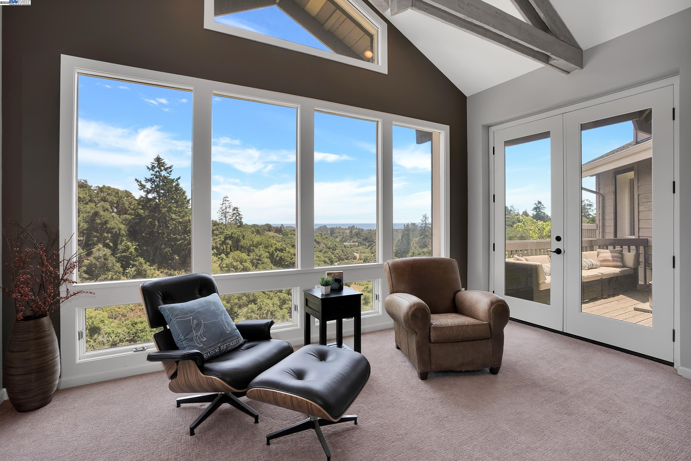 905 Moon Valley Ranch Road Watsonville, CA 95076 - Photo 18 of 60 a living room with furniture and floor to ceiling windows