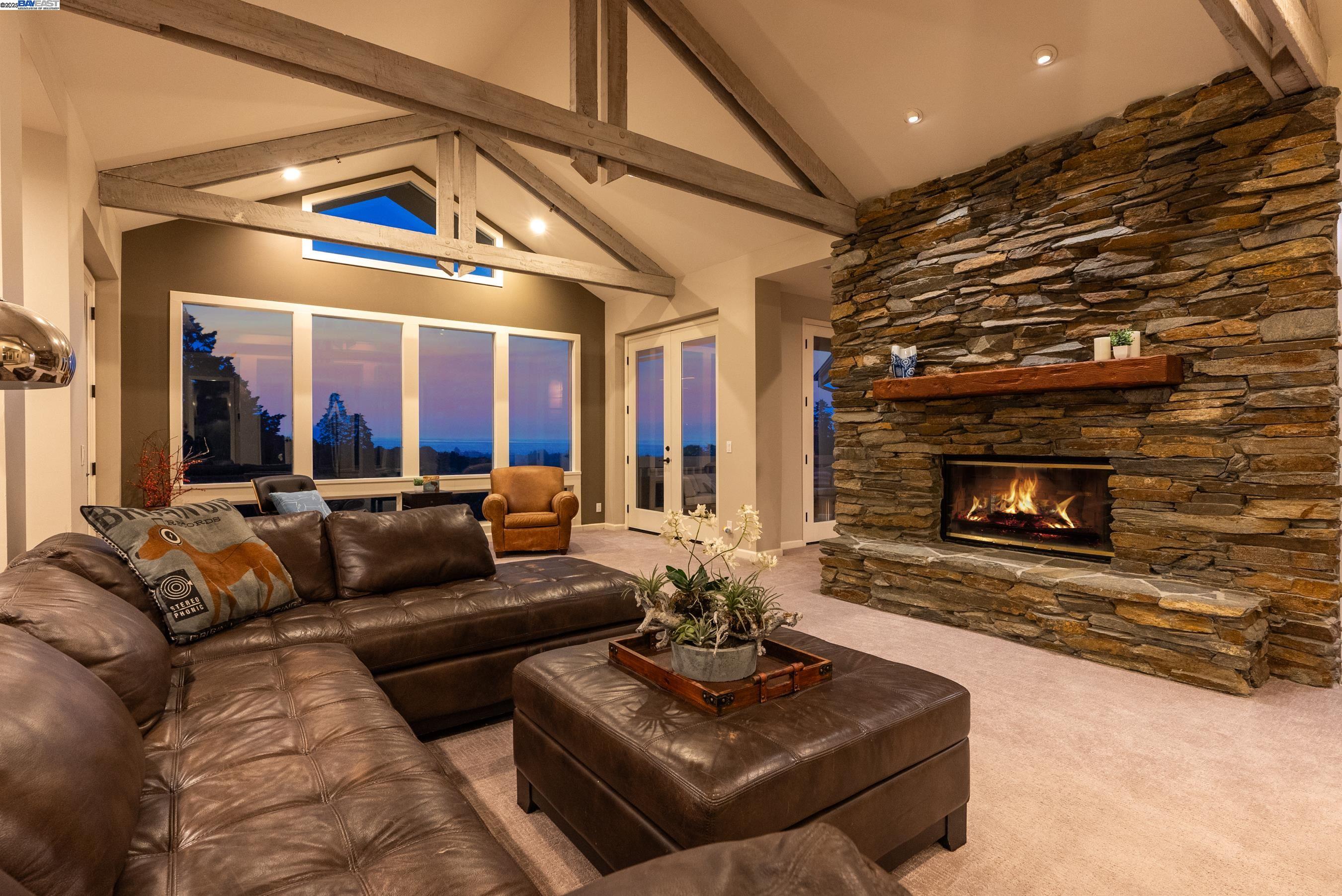 905 Moon Valley Ranch Road Watsonville, CA 95076 - Photo 19 of 60 a living room with furniture and a fireplace