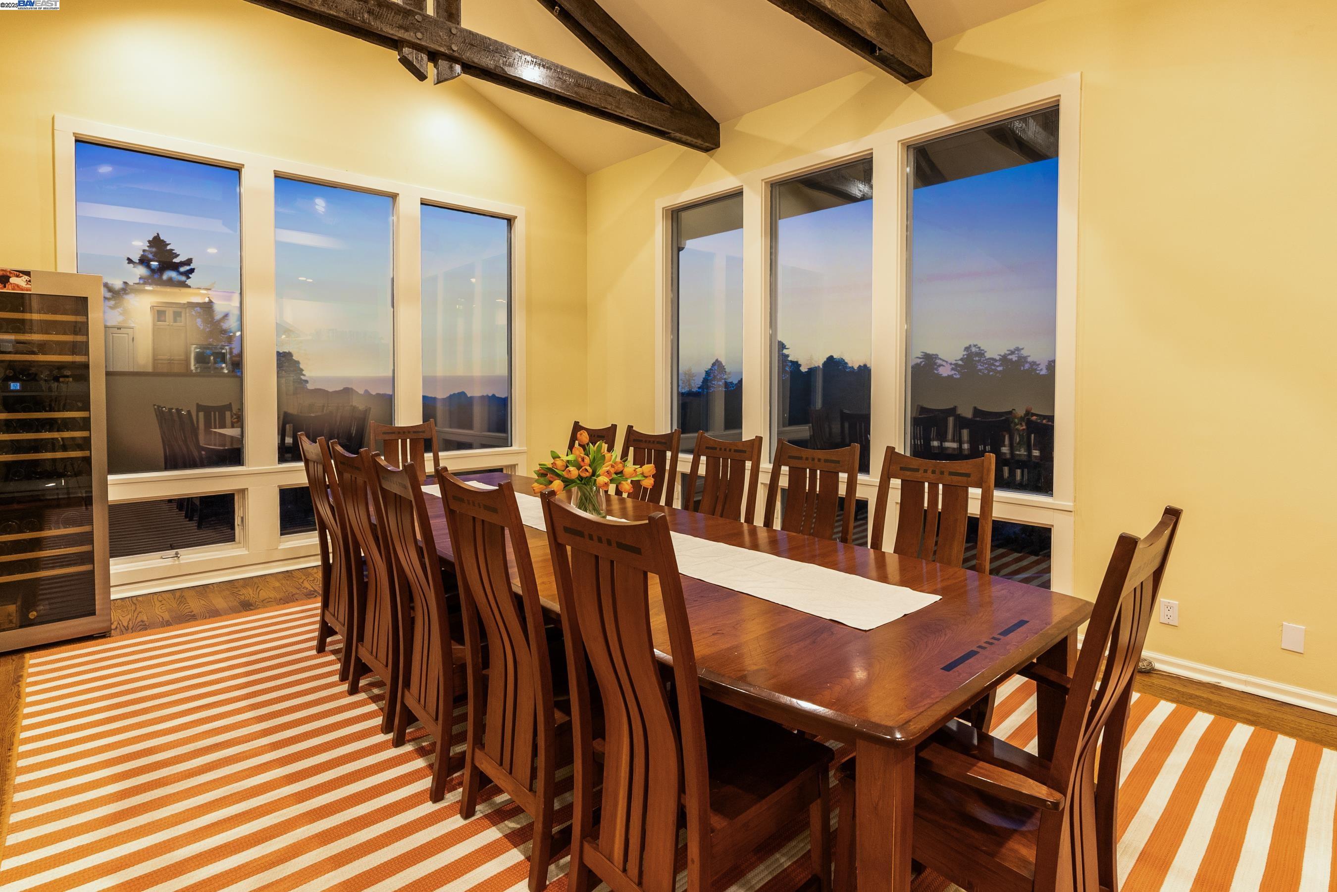905 Moon Valley Ranch Road Watsonville, CA 95076 - Photo 32 of 60 a view of a dining room with furniture and wooden floor