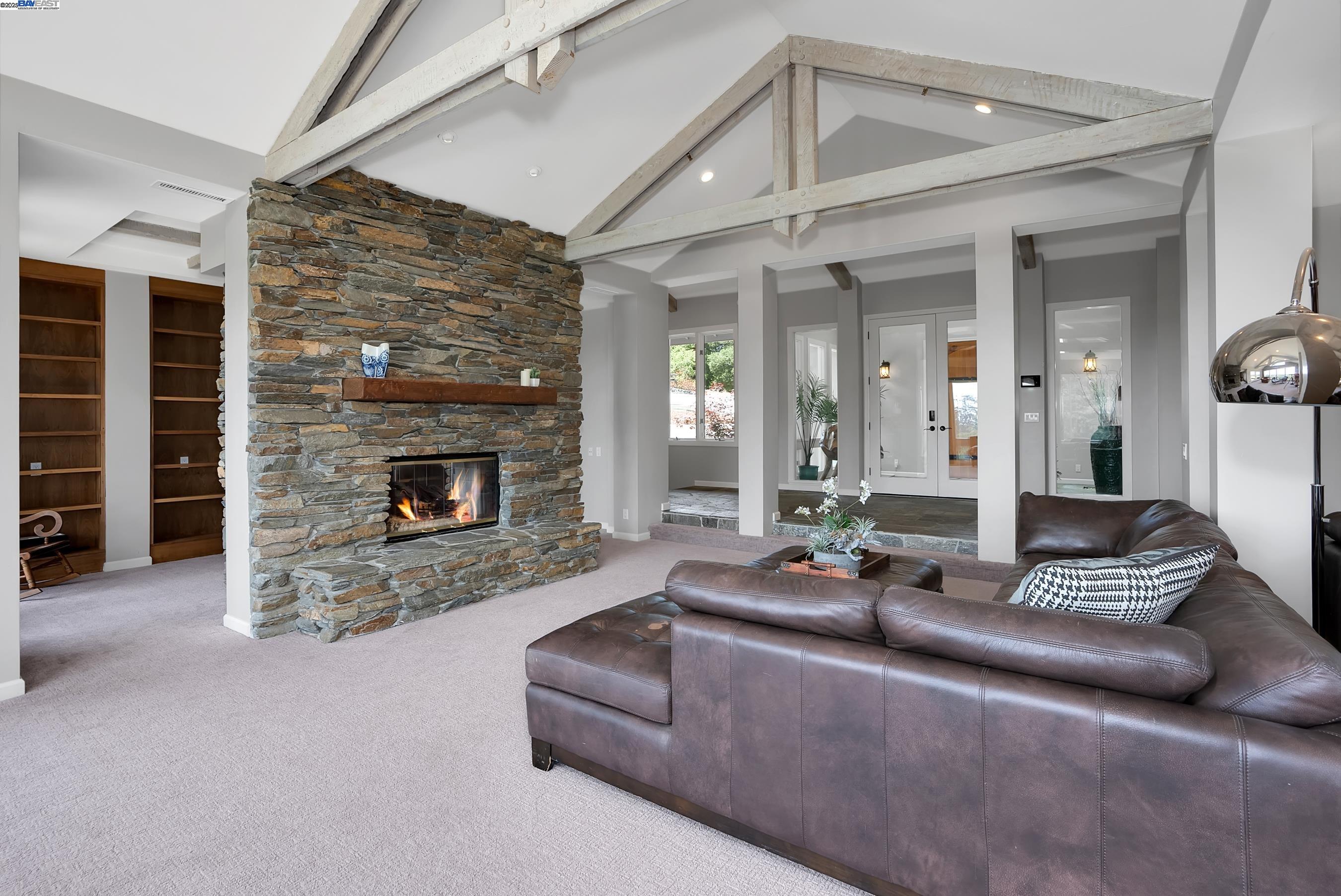 905 Moon Valley Ranch Road Watsonville, CA 95076 - Photo 34 of 60 a living room with furniture and a fireplace