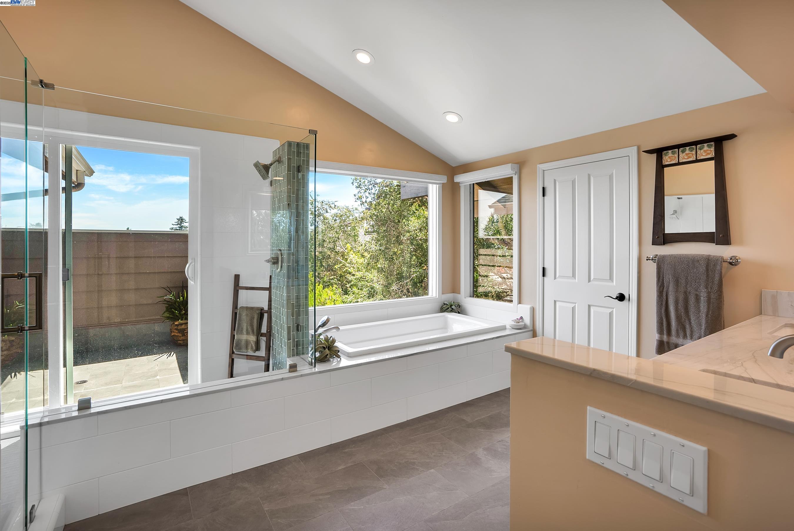 905 Moon Valley Ranch Road Watsonville, CA 95076 - Photo 39 of 60 a large living room with a large window and front door