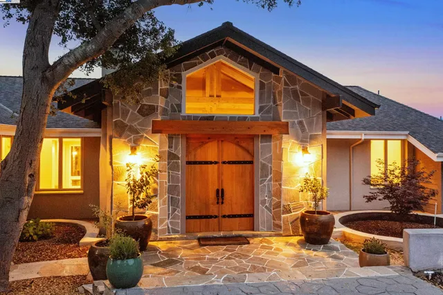 a front view of a house with patio