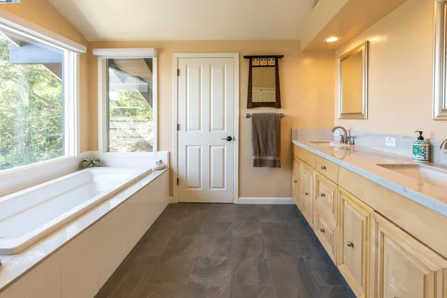 a view of an house with backyard space and garden