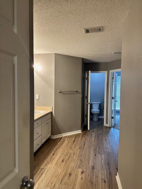 2155 Hagood Loop Crestview, FL 32536 - Photo 8 of 16 an empty room with wooden floor and closet