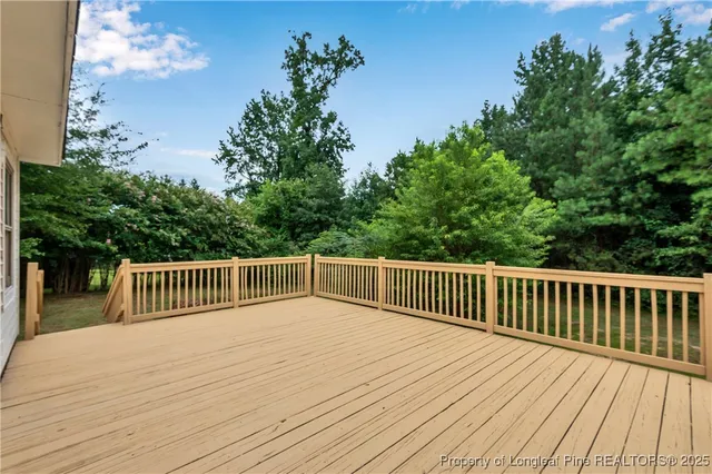 a view of deck with a garden
