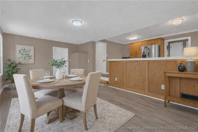 a view of a dining room with furniture
