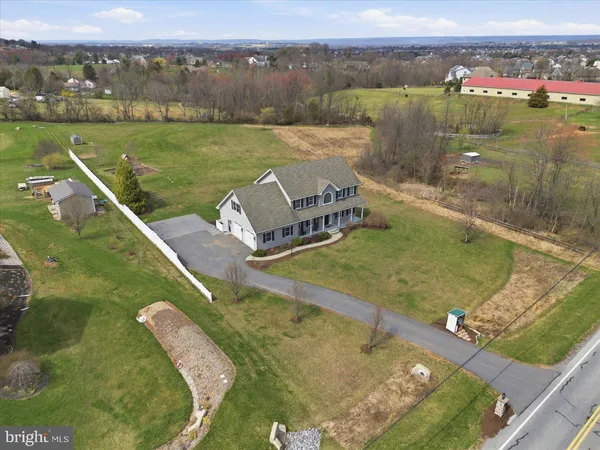 a view of a lake with a yard