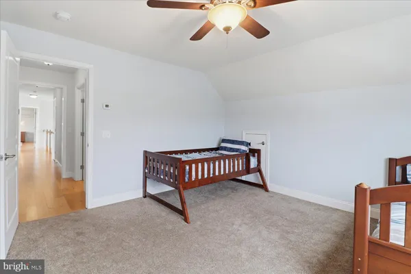 a view of a livingroom with furniture and wooden floor