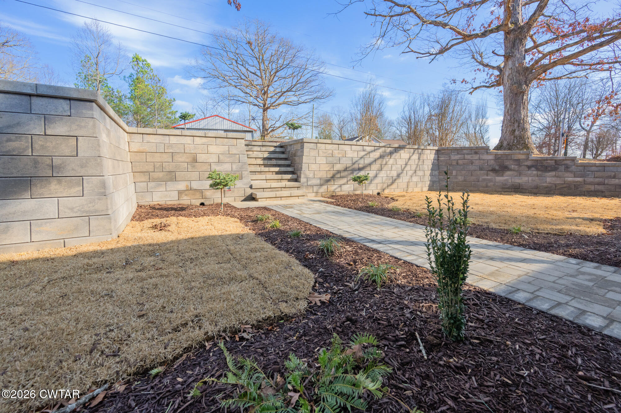 992 Greenway Road Huron, TN 38345 - Photo 2 of 17 a view of a yard with wooden fence
