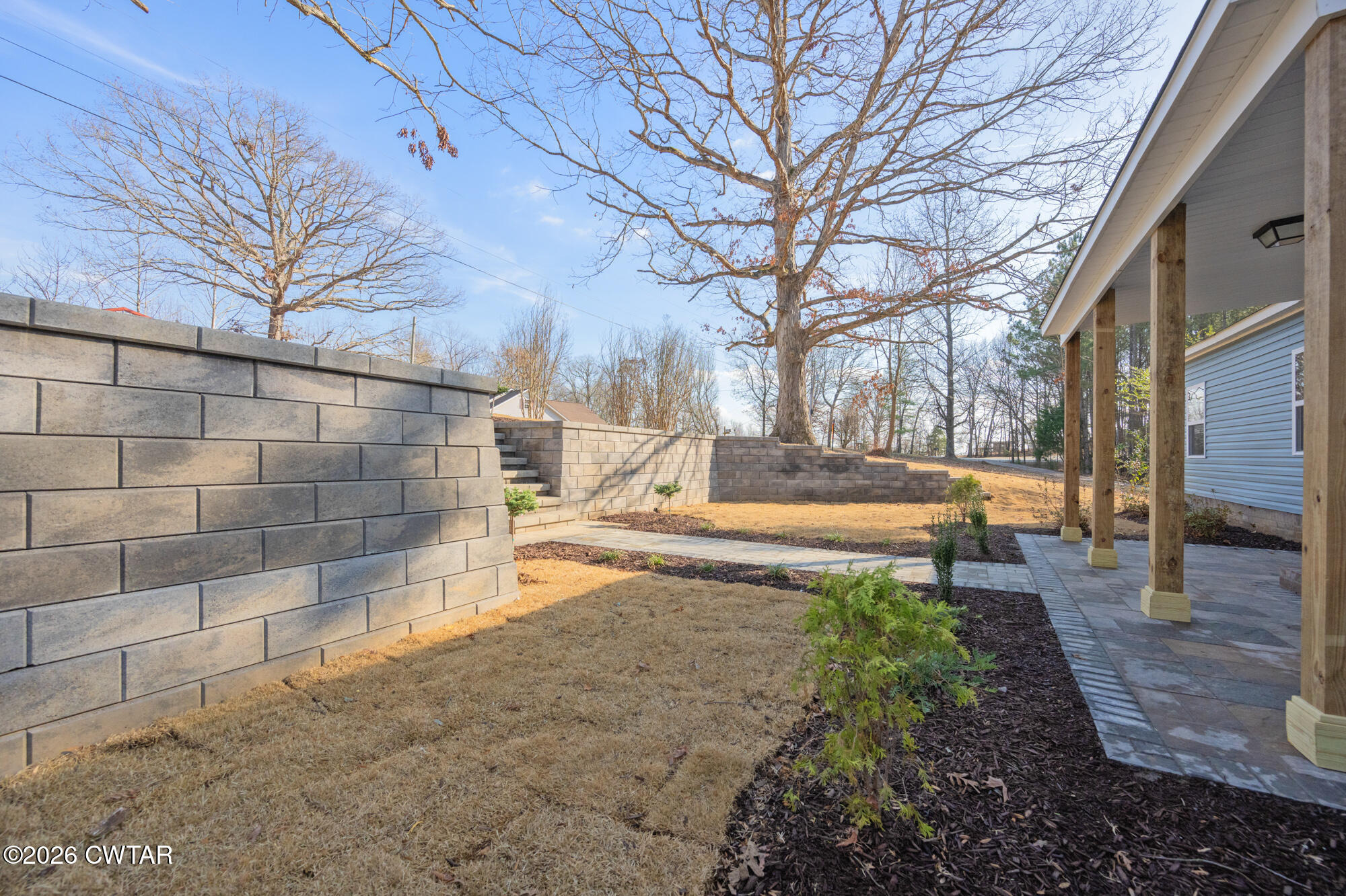 992 Greenway Road Huron, TN 38345 - Photo 5 of 17 a view of a yard with trees