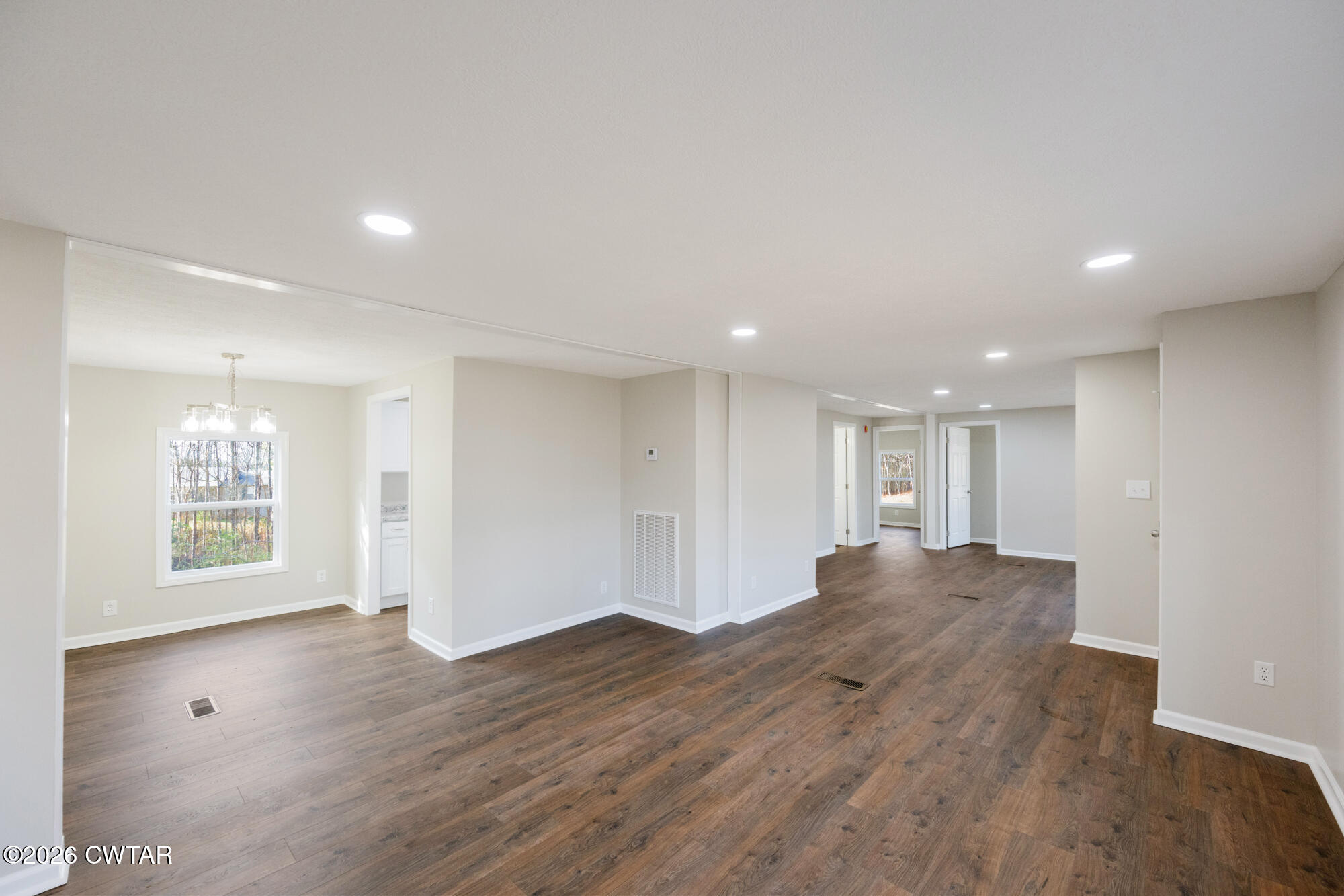 992 Greenway Road Huron, TN 38345 - Photo 7 of 17 a view of empty room with wooden floor and fan