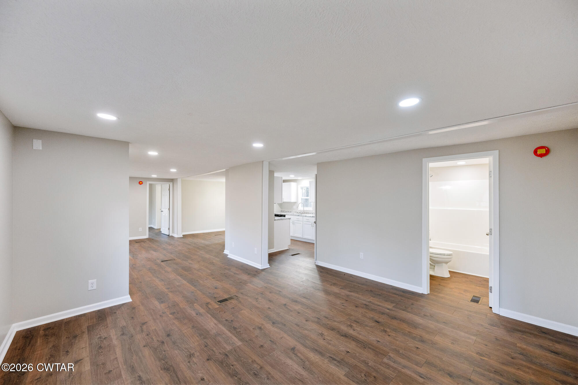992 Greenway Road Huron, TN 38345 - Photo 8 of 17 a view of an empty room with wooden floor