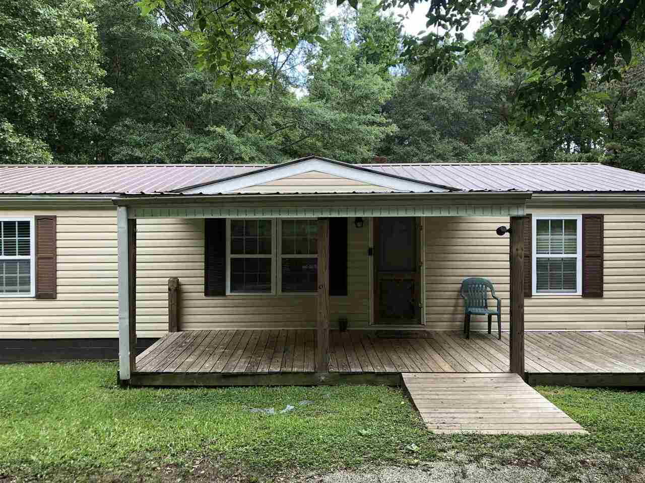 222 Robinson Road Newnan, GA 30263 - Photo 1 of 1 a view of a house with a garden