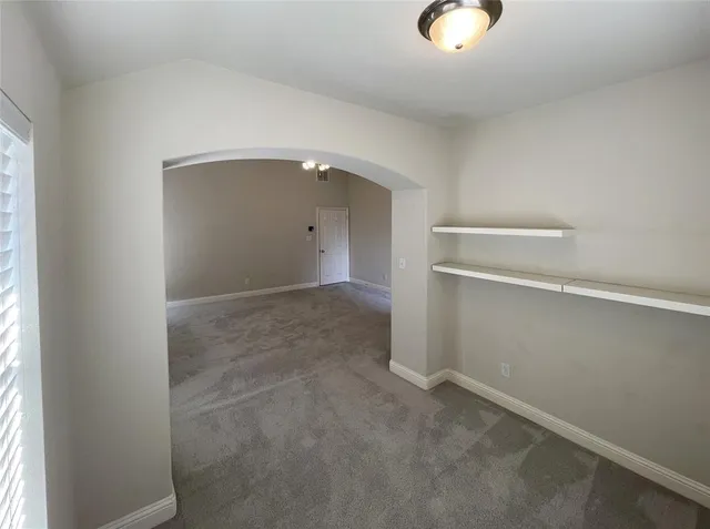 an empty room with window