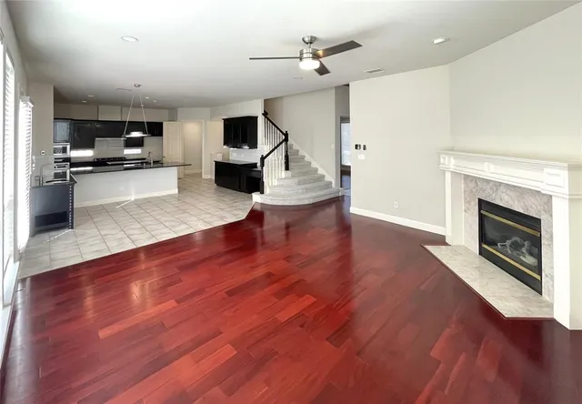 a view of kitchen with cabinets and wooden floor