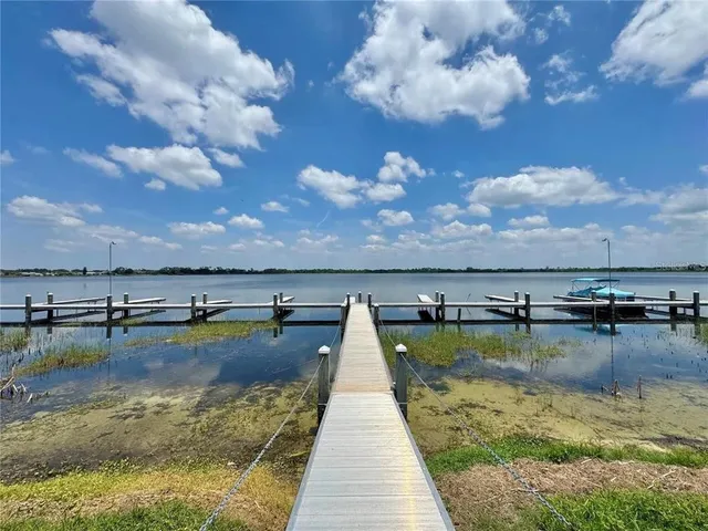 a view empty room with furniture and a hallway