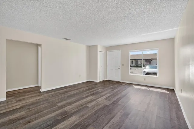 a kitchen with stainless steel appliances a sink stove and refrigerator