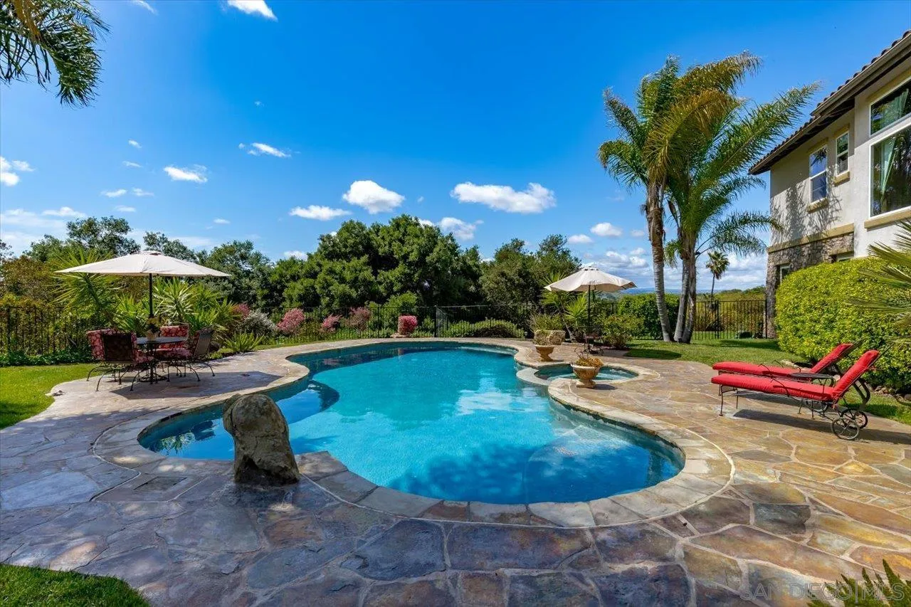 1505 Chateau Lafite Bonsall, CA 92003 - Photo 35 of 47 a view of a swimming pool with sitting area